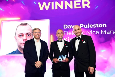 Dave Puleston posing with his award at the AV Awards